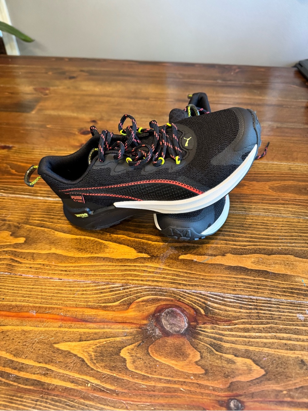 Puma Black Trainers with Neon Yellow and Pink Accents